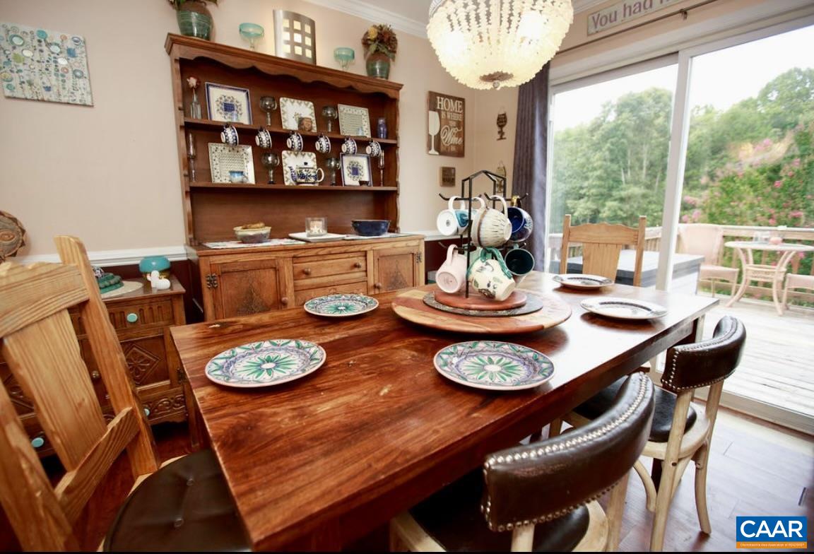 166 Oak View Road Barboursville, VA 22923 - Photo 3 of 46 a dining room with furniture and a window