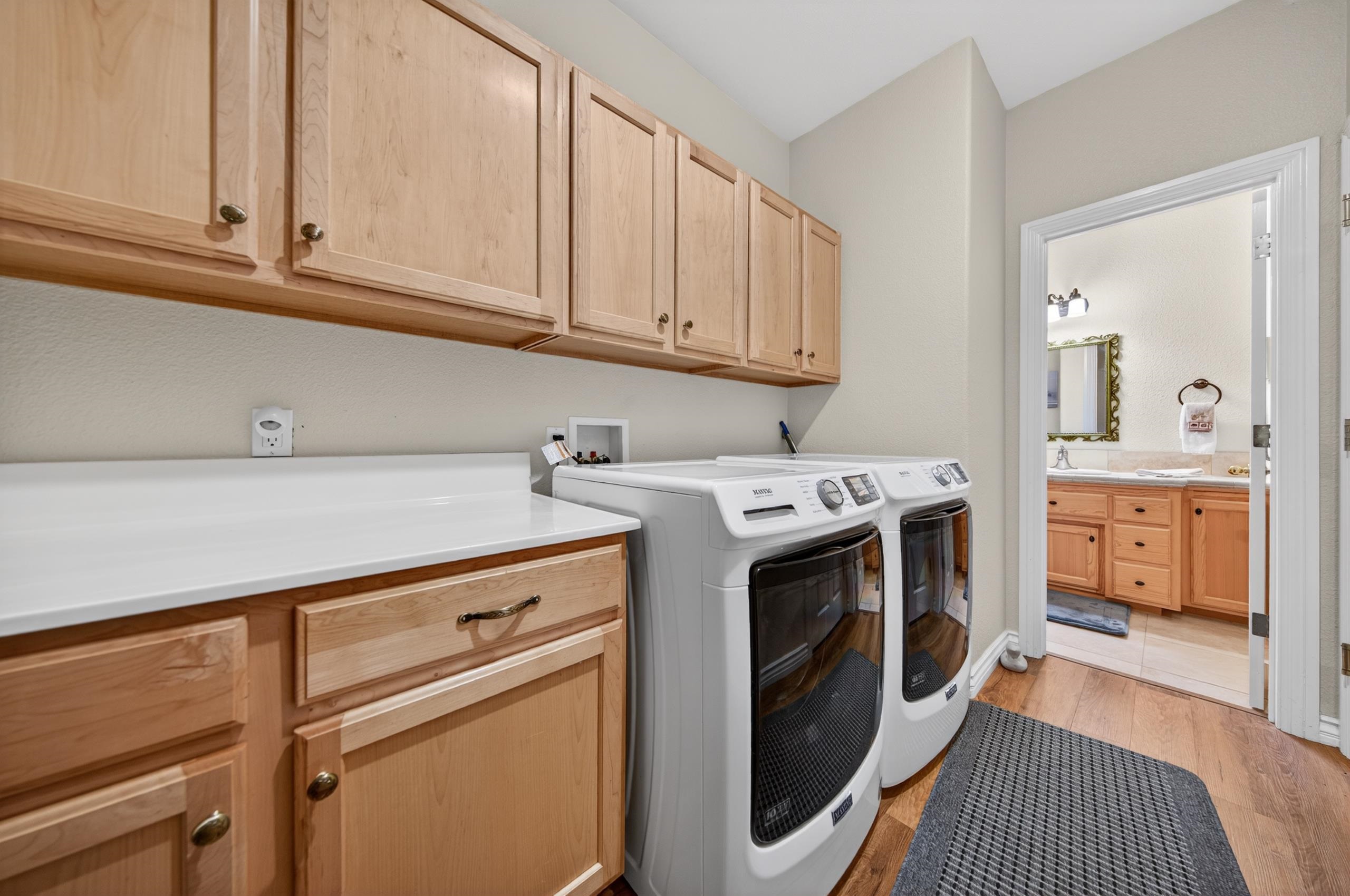 1017 Timber Ridge Road Lake Almanor, CA 96137 - Photo 30 of 45 a utility room with dryer and washer