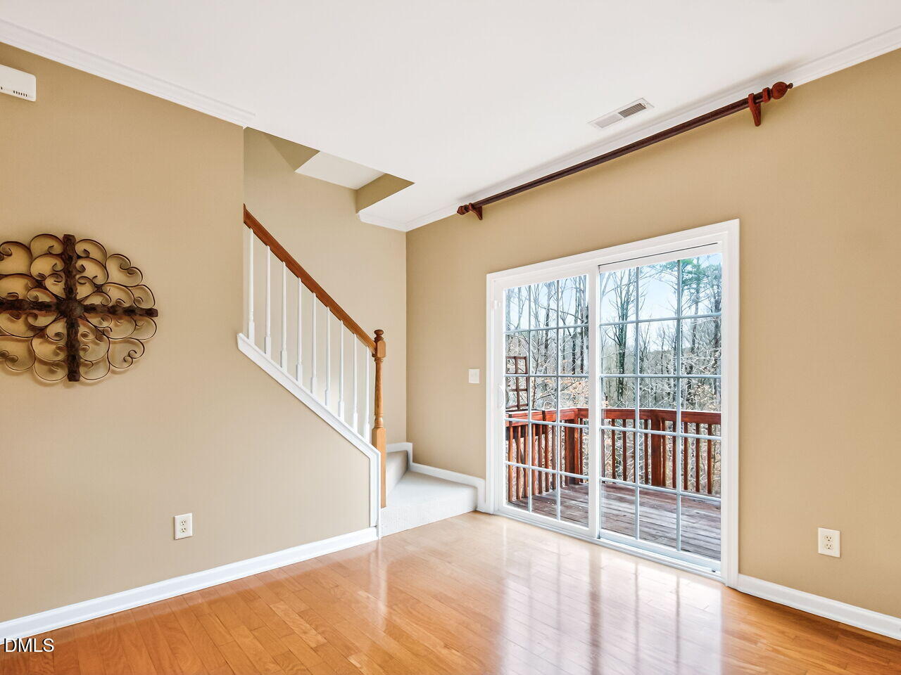 102 Grey Elm Trail Durham, NC 27713 - Photo 19 of 38 a view of a big room with wooden floor and windows