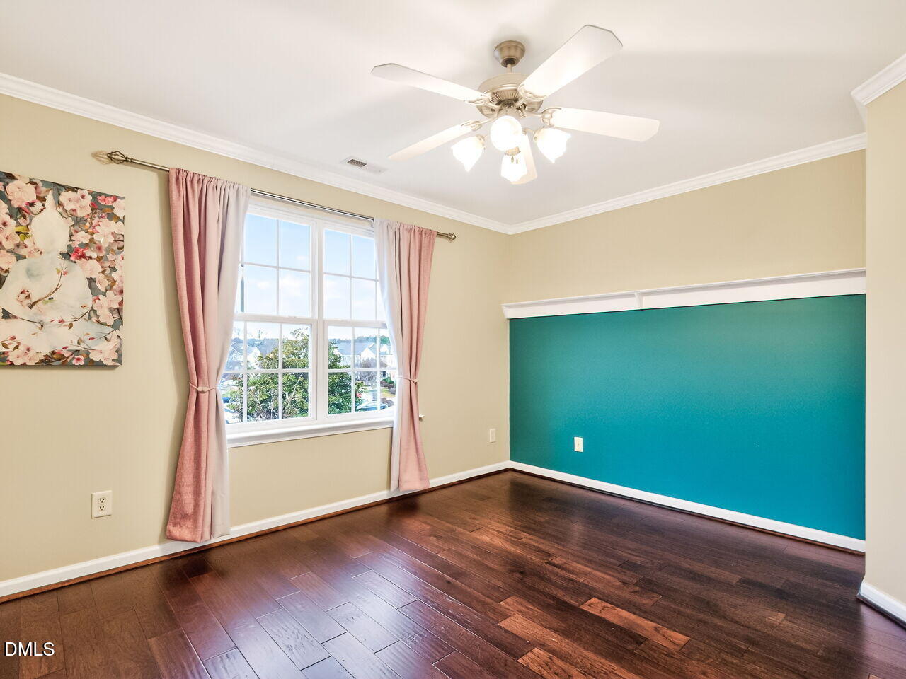 102 Grey Elm Trail Durham, NC 27713 - Photo 24 of 38 an empty room with wooden floor and windows