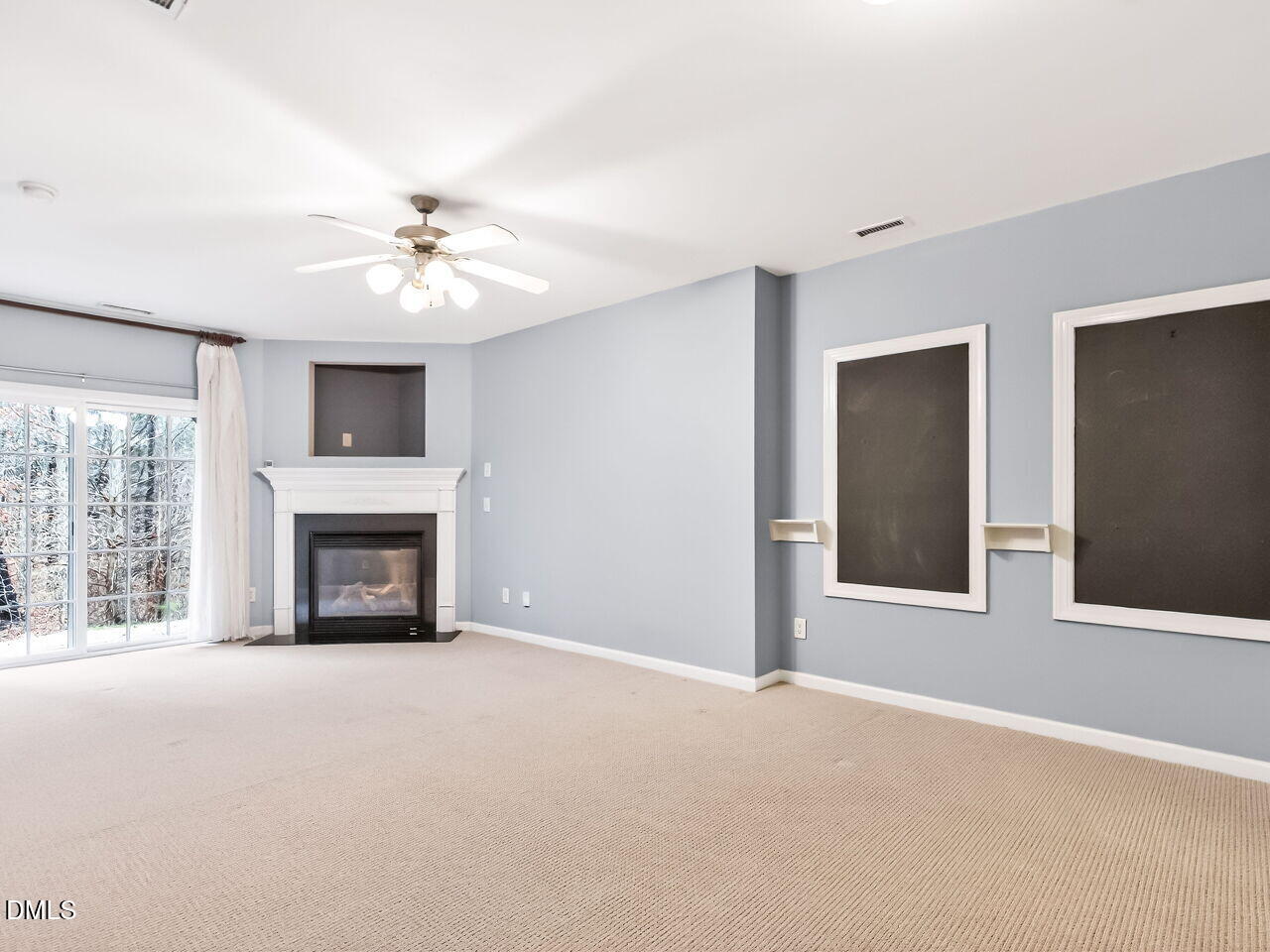 102 Grey Elm Trail Durham, NC 27713 - Photo 29 of 38 a view of a livingroom with an empty space and a fireplace