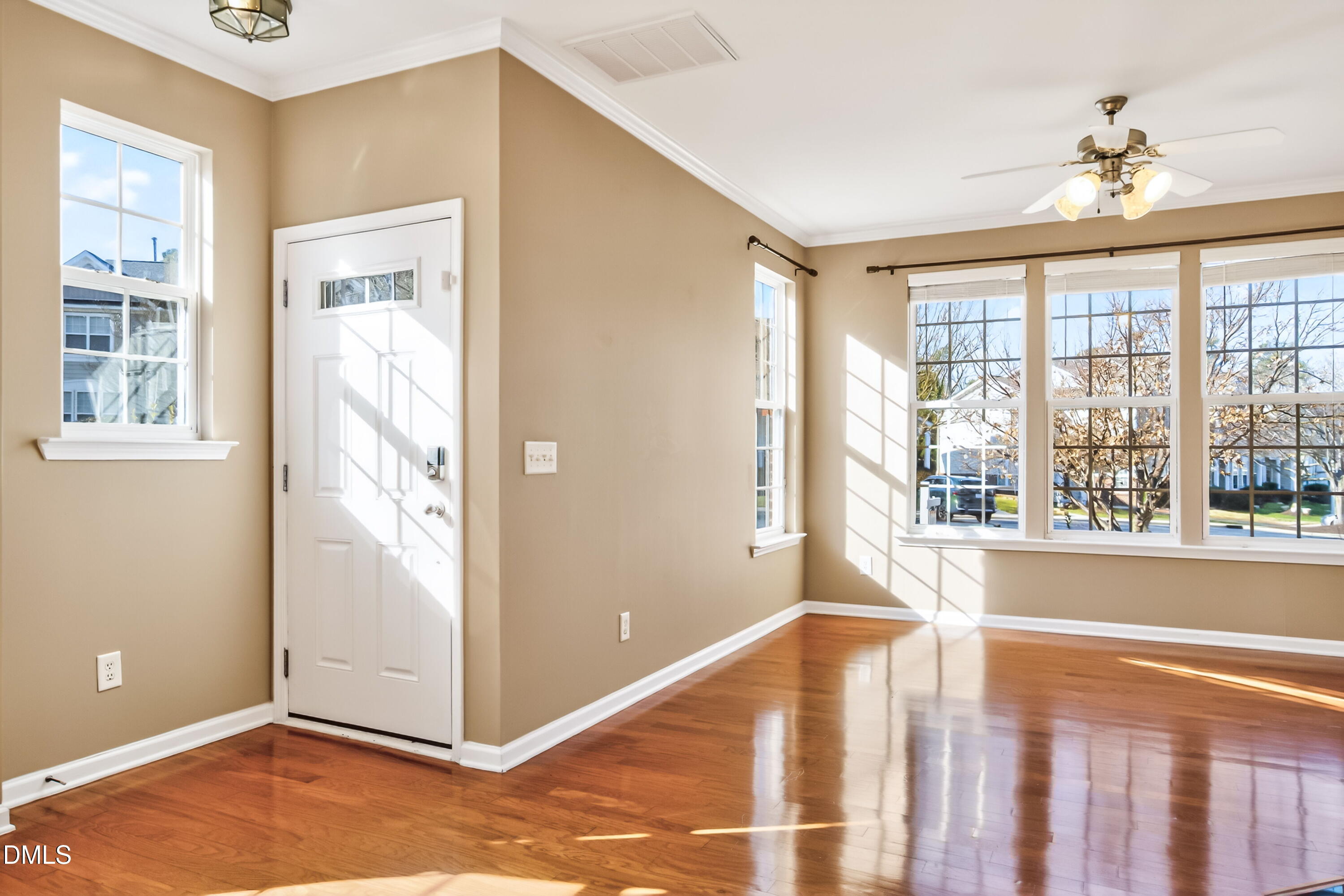 102 Grey Elm Trail Durham, NC 27713 - Photo 5 of 38 a view of livingroom with wooden floor and windows