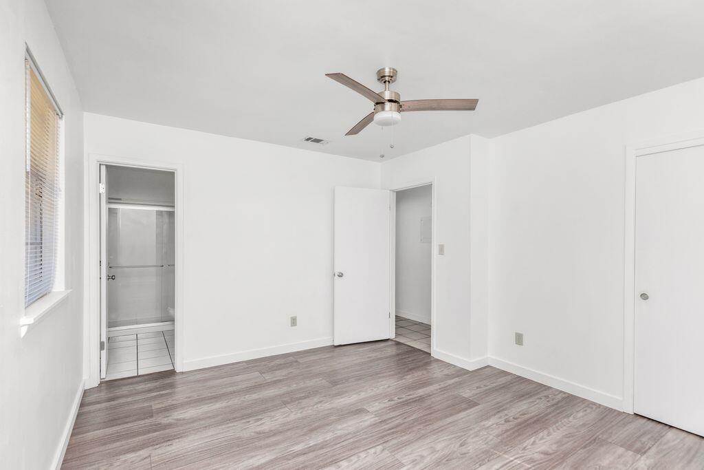 1313 Finck Road Niceville, FL 32578 - Photo 13 of 16 a view of empty room with wooden floor
