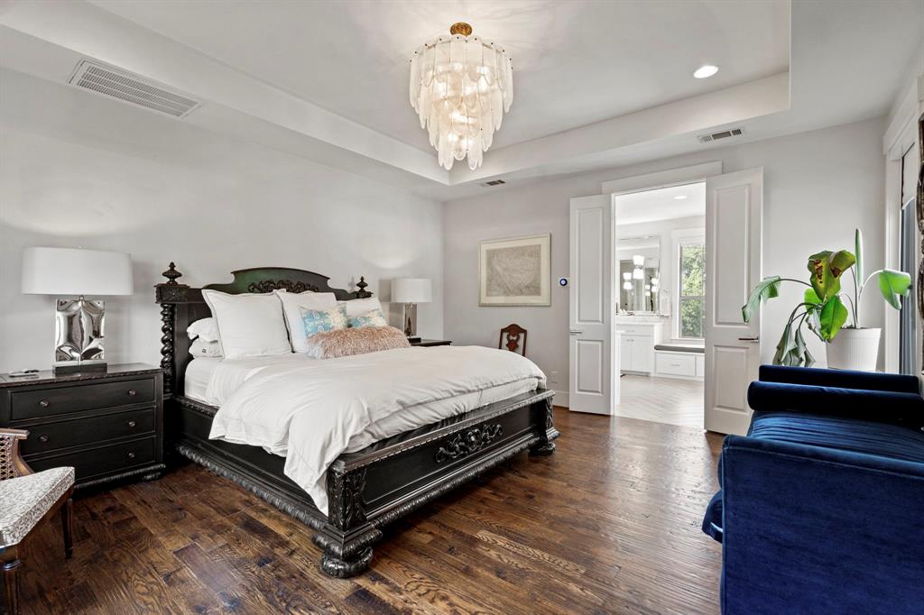 7102 Coronado Avenue Dallas, TX 75214 - Photo 12 of 30 a bedroom with bed and a window