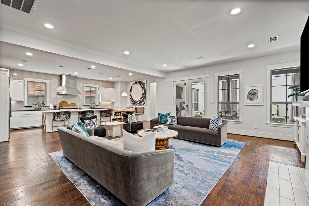 7102 Coronado Avenue Dallas, TX 75214 - Photo 2 of 30 a living room with furniture and a large window
