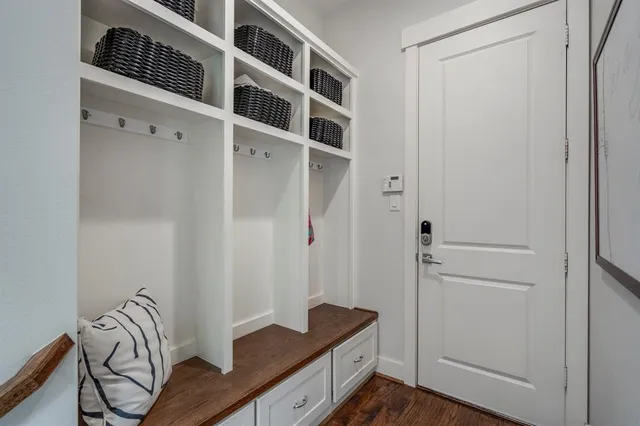 a view of wooden floor and closet