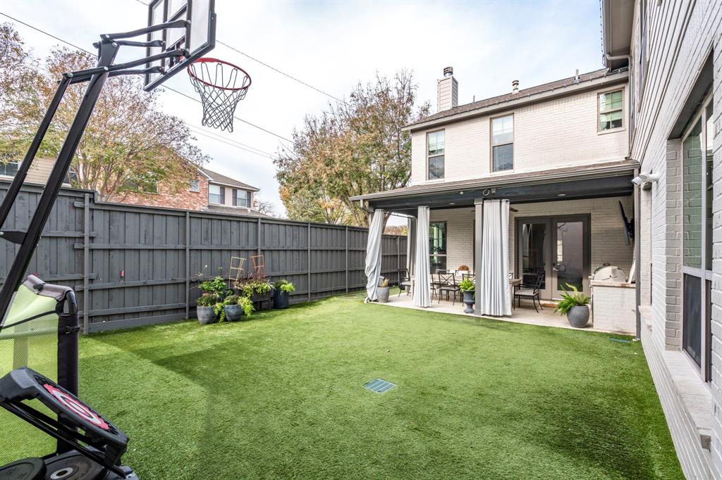 7102 Coronado Avenue Dallas, TX 75214 - Photo 30 of 30 a view of a house with a yard and sitting area