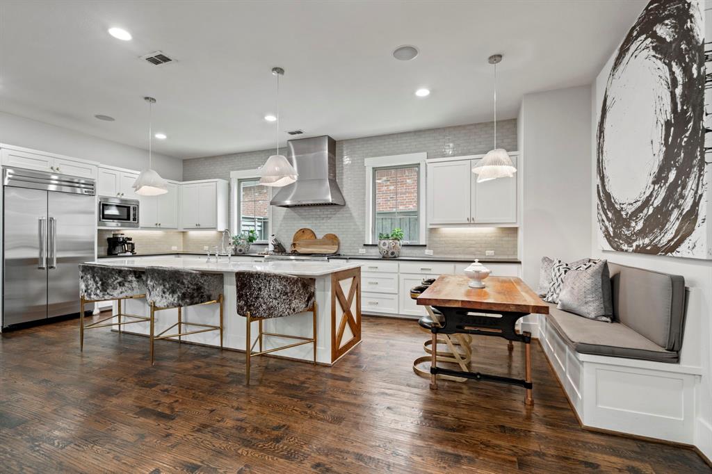 7102 Coronado Avenue Dallas, TX 75214 - Photo 4 of 30 a living room with stainless steel appliances kitchen island granite countertop furniture and a kitchen view