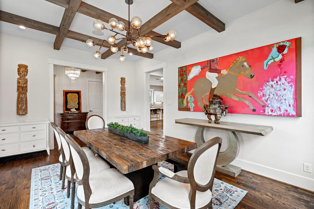 7102 Coronado Avenue Dallas, TX 75214 - Photo 7 of 30 a view of a dining room with furniture a chandelier and wooden floor