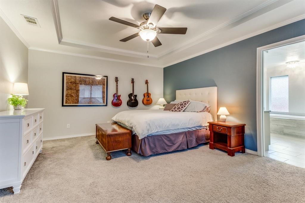 10014 Silver Creek Road Dallas, TX 75243 - Photo 11 of 19 Primary bedroom