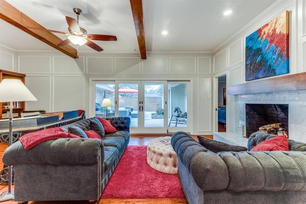 10014 Silver Creek Road Dallas, TX 75243 - Photo 2 of 19 Living room with sliding doors to patio