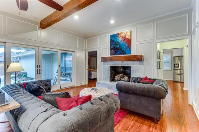 a living room with furniture or couch and a fireplace