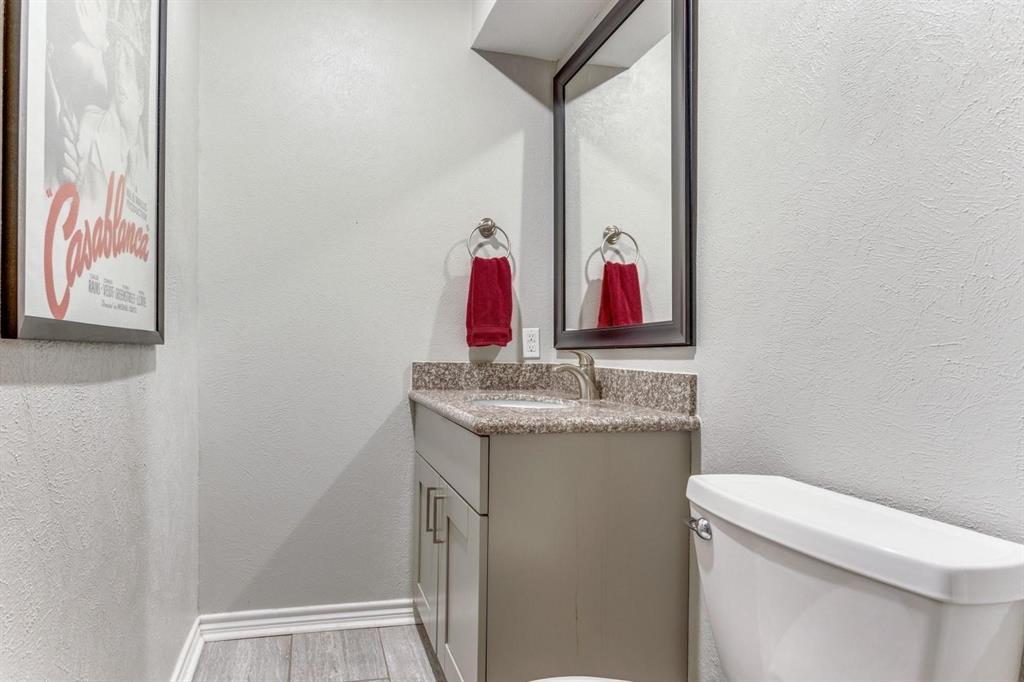 10014 Silver Creek Road Dallas, TX 75243 - Photo 10 of 19 Guest half bath off den