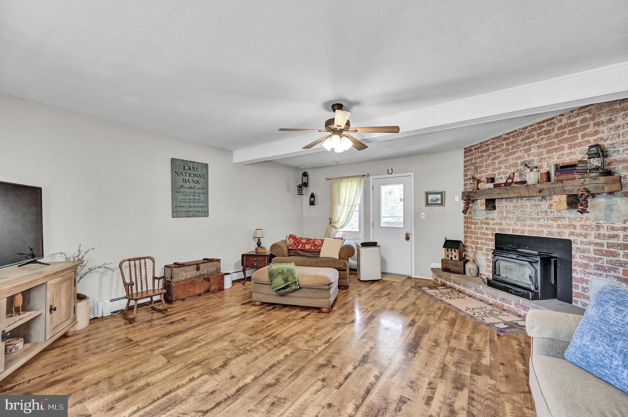 410 Days Mill Road York, PA 17403 - Photo 15 of 38 a living room with furniture and a fireplace