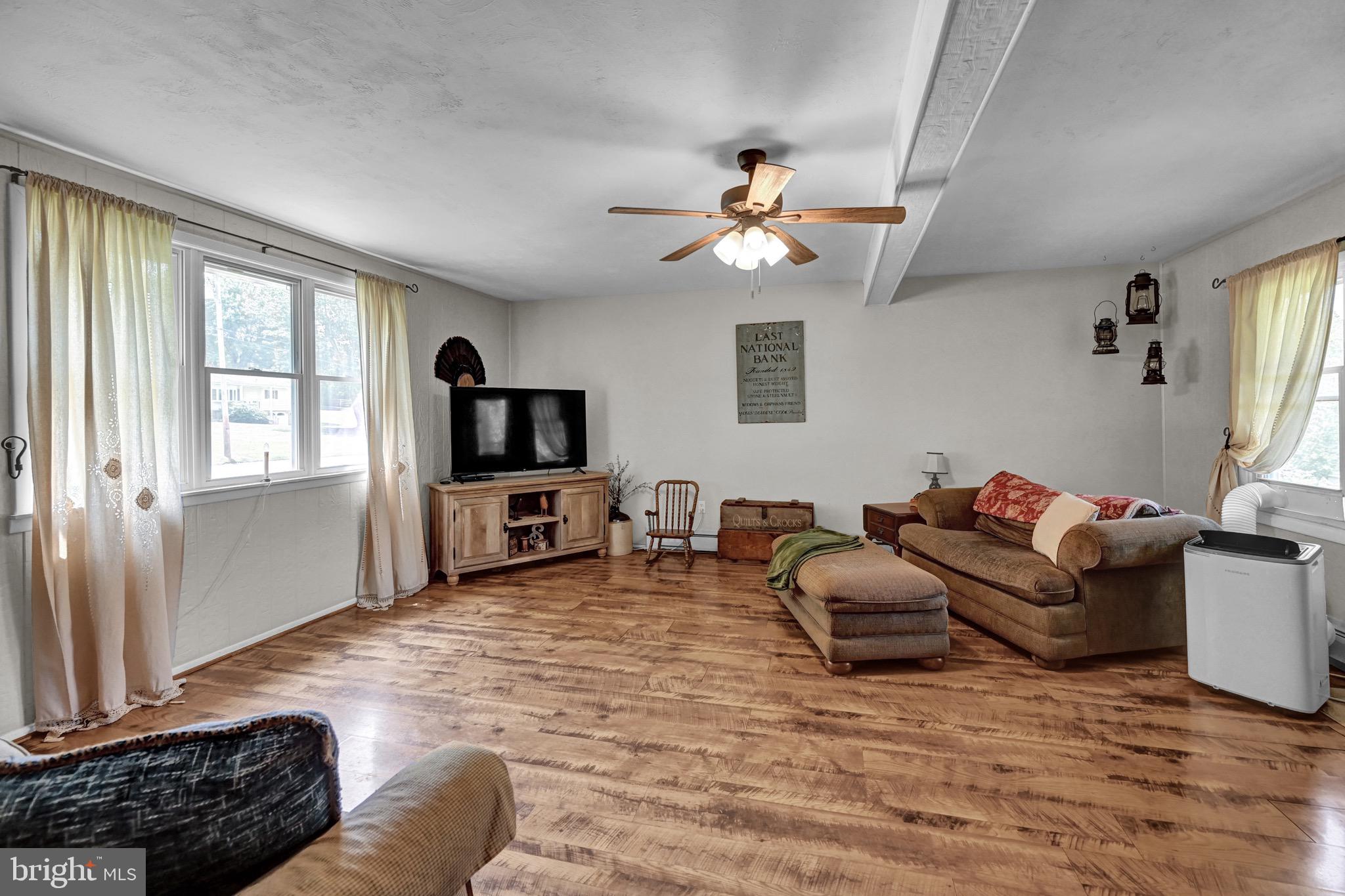 410 Days Mill Road York, PA 17403 - Photo 16 of 38 a living room with furniture and a flat screen tv