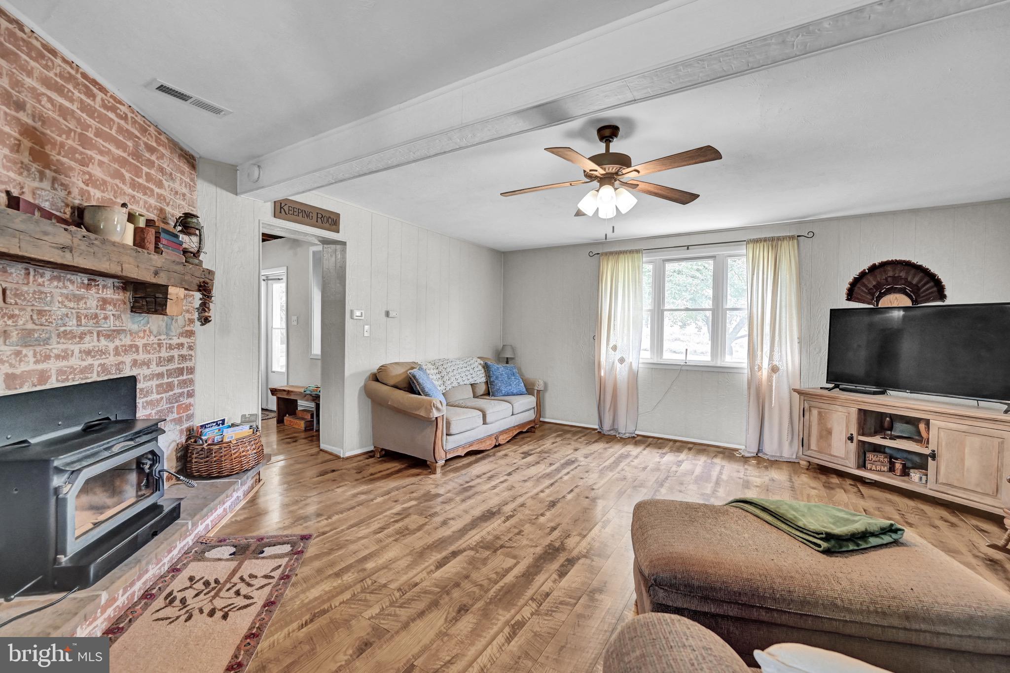 410 Days Mill Road York, PA 17403 - Photo 17 of 38 a living room with furniture fireplace and flat screen tv