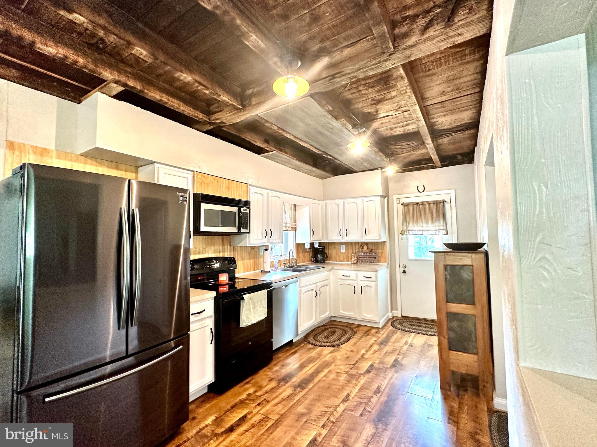 410 Days Mill Road York, PA 17403 - Photo 18 of 38 a kitchen with stainless steel appliances granite countertop a refrigerator and a stove