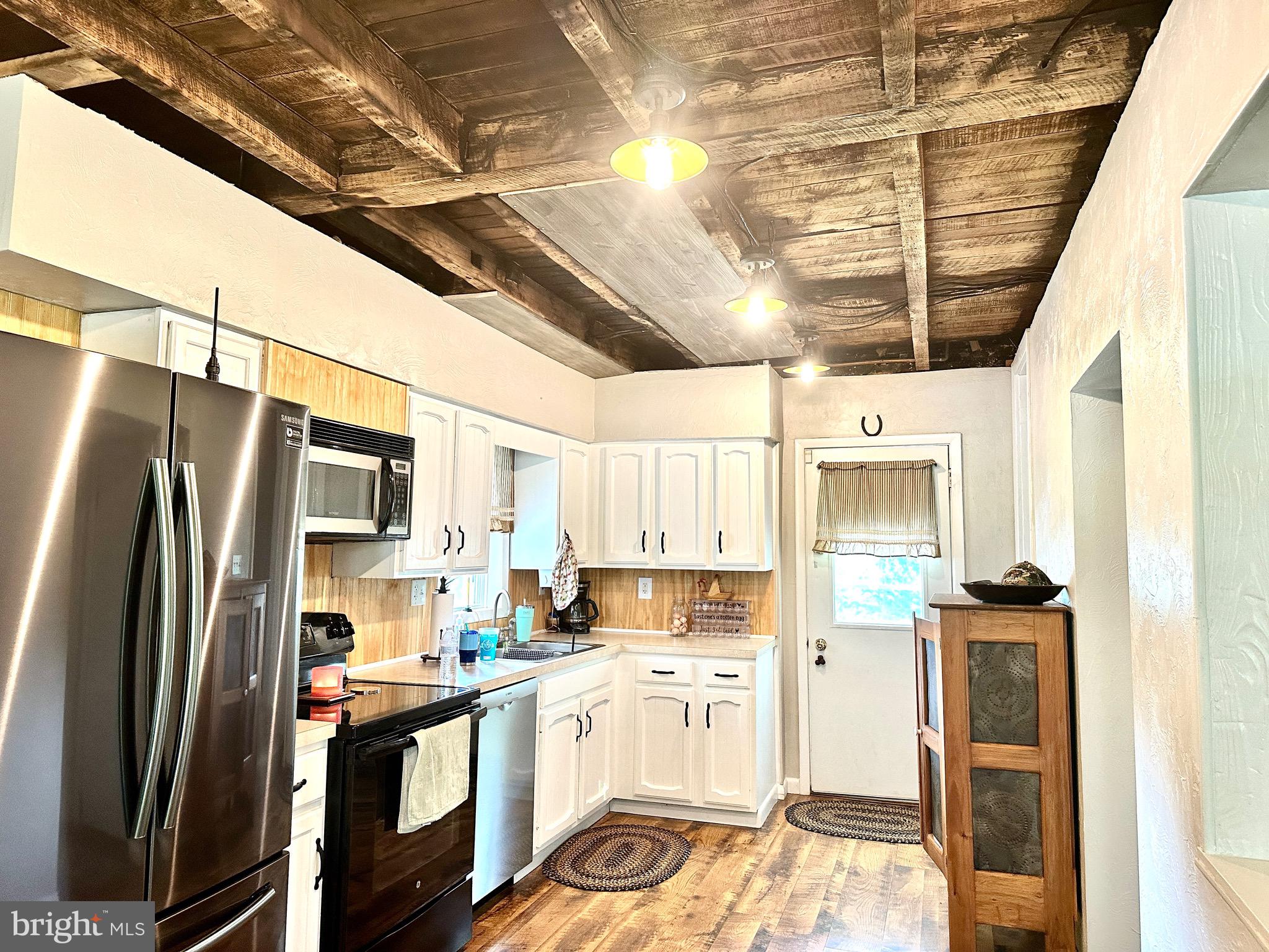 410 Days Mill Road York, PA 17403 - Photo 19 of 38 a kitchen with stainless steel appliances a refrigerator and a stove