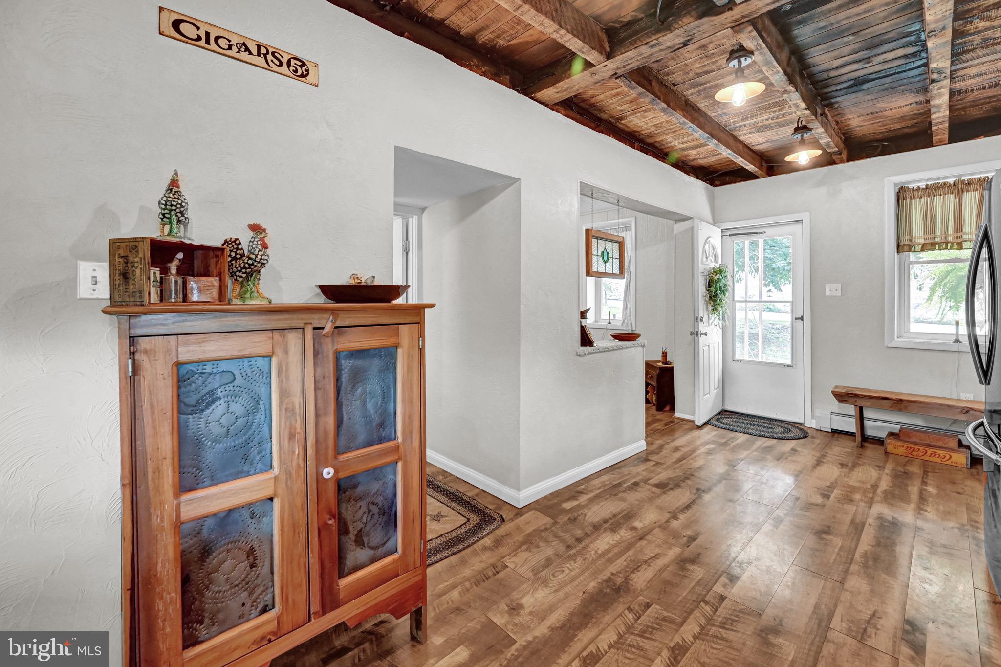 410 Days Mill Road York, PA 17403 - Photo 21 of 38 a view of a livingroom with wooden floor and a window