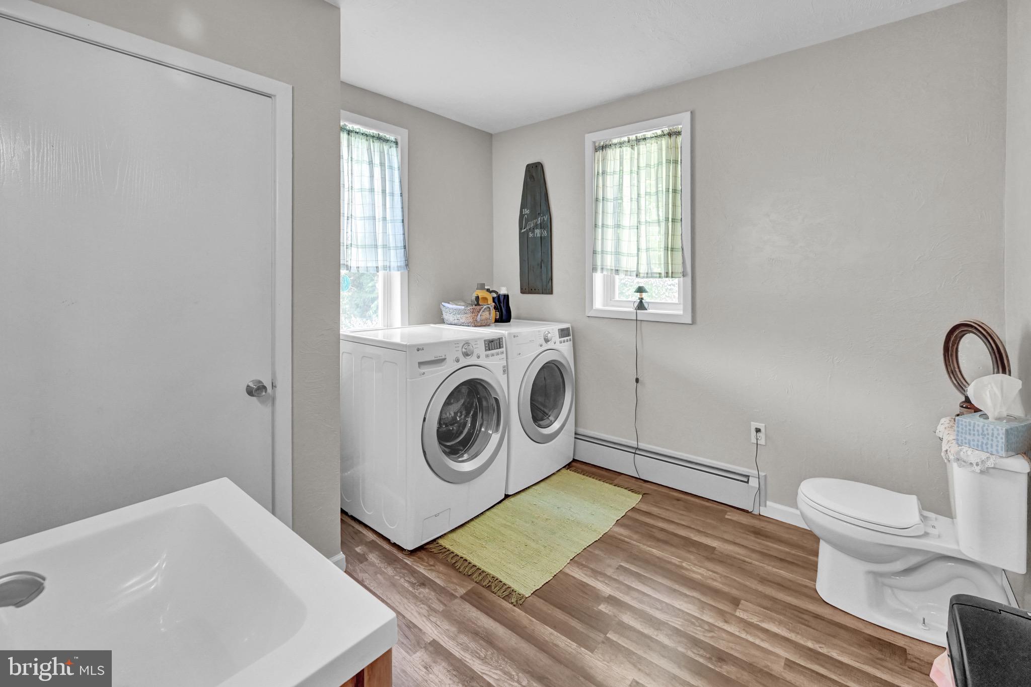 410 Days Mill Road York, PA 17403 - Photo 26 of 38 a utility room with a window dryer and washer