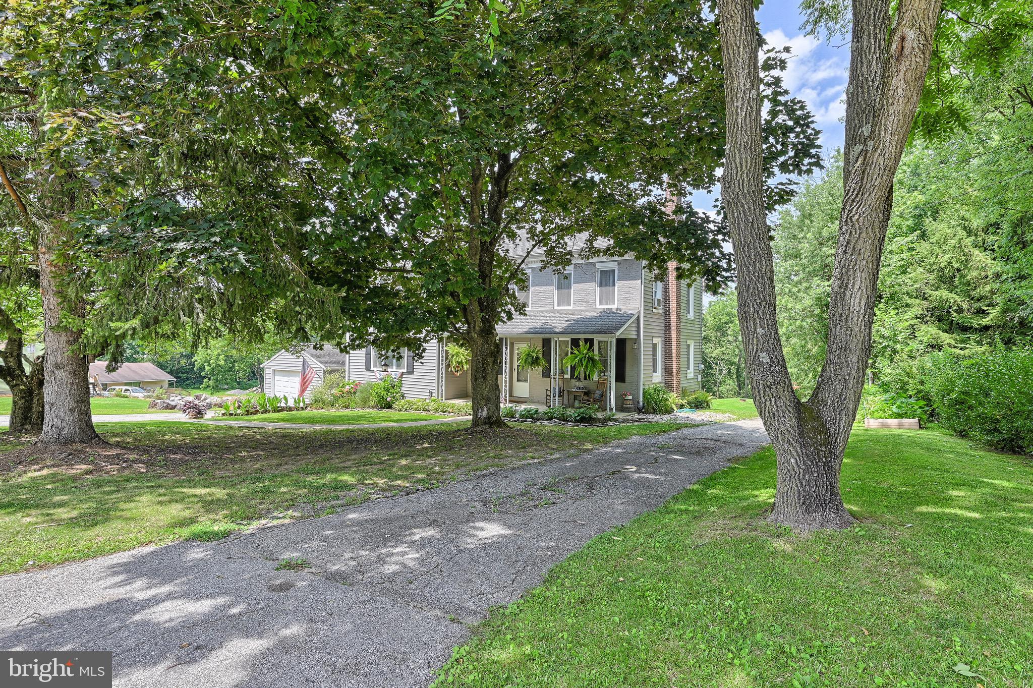 410 Days Mill Road York, PA 17403 - Photo 5 of 38 a view of a house with a yard