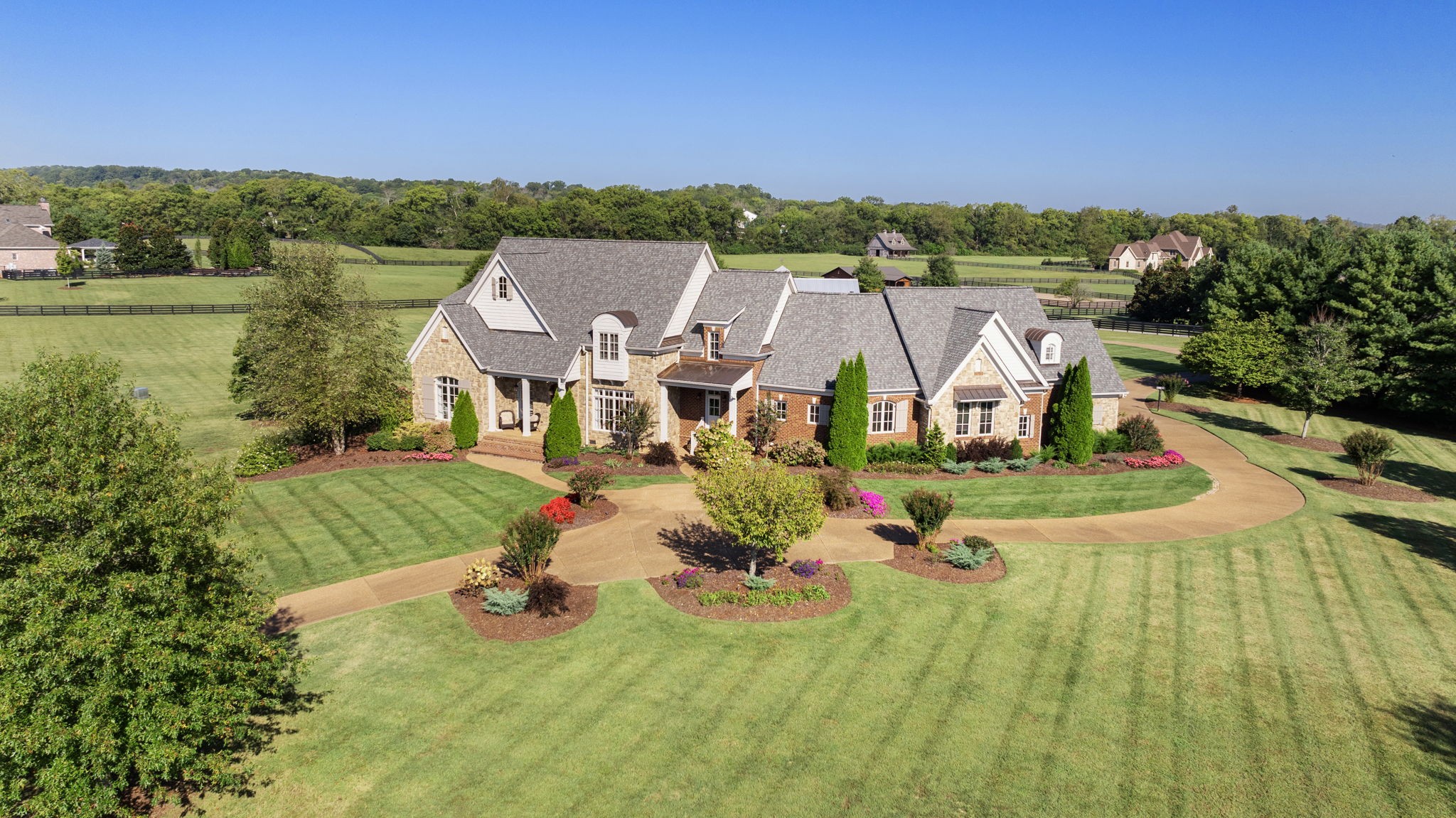 a view of a lake with a house in the background
