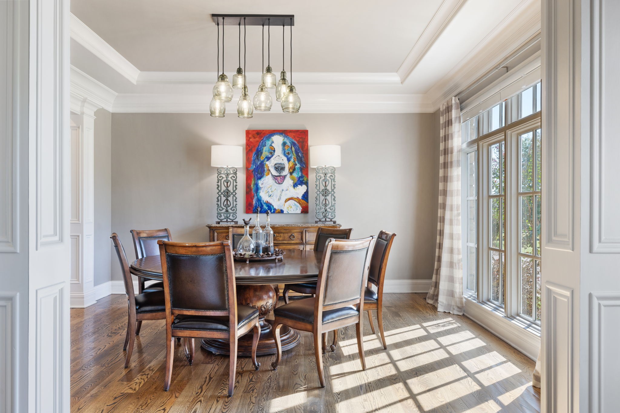 4219 Two Rivers Lane Franklin, TN 37069 - Photo 11 of 69 a view of a dining room with furniture a chandelier and wooden floor