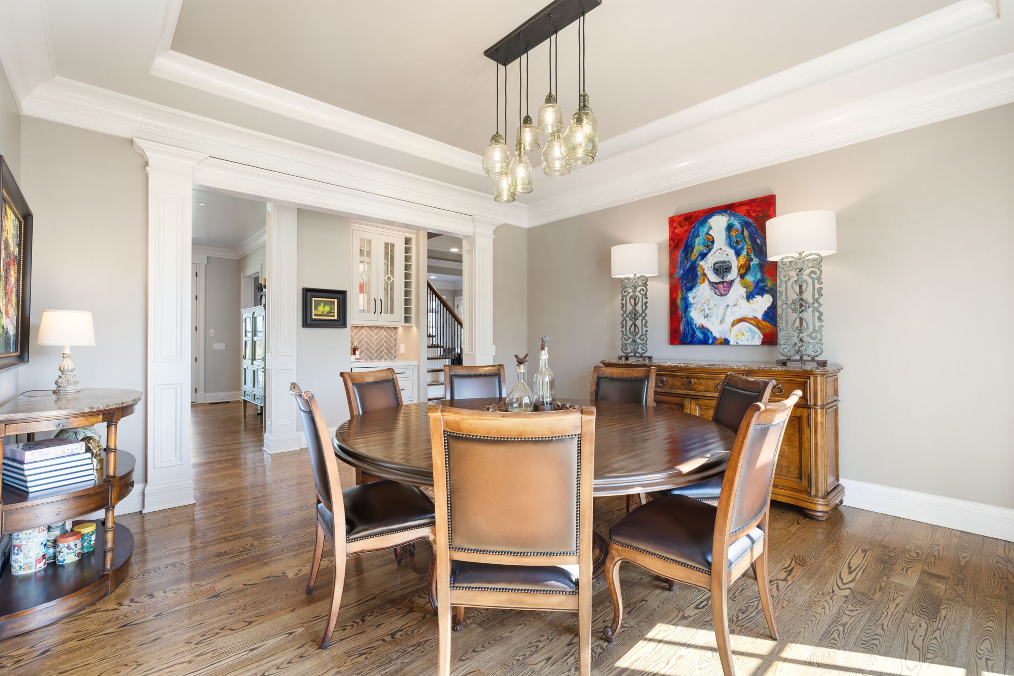 4219 Two Rivers Lane Franklin, TN 37069 - Photo 12 of 69 a dining room with furniture a rug and a chandelier