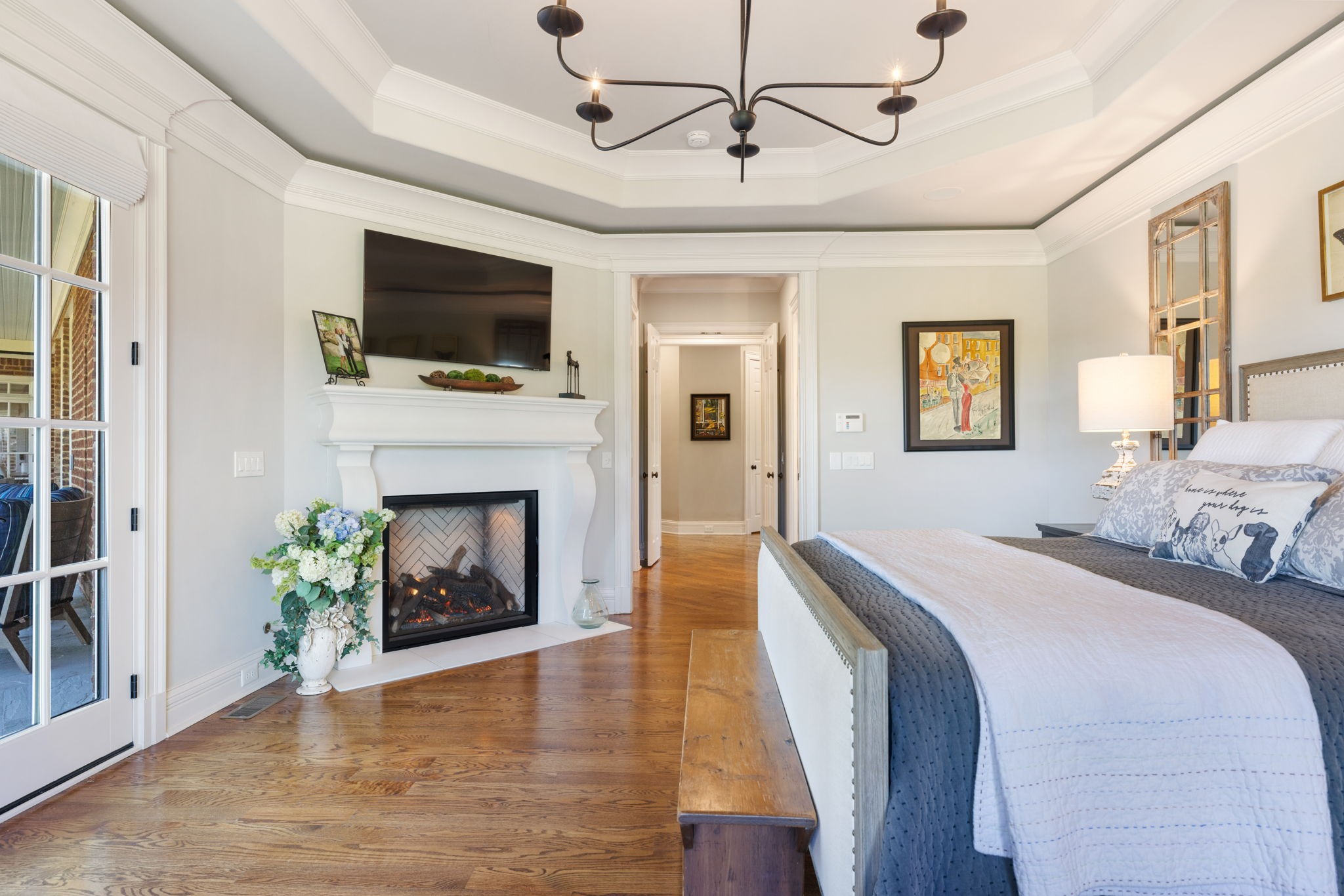 4219 Two Rivers Lane Franklin, TN 37069 - Photo 31 of 69 a spacious bedroom with a bed and a flat screen tv