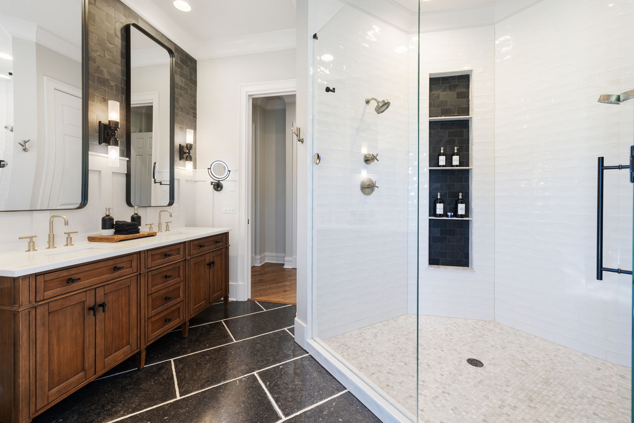 4219 Two Rivers Lane Franklin, TN 37069 - Photo 36 of 69 a spacious bathroom with a shower sink and mirror