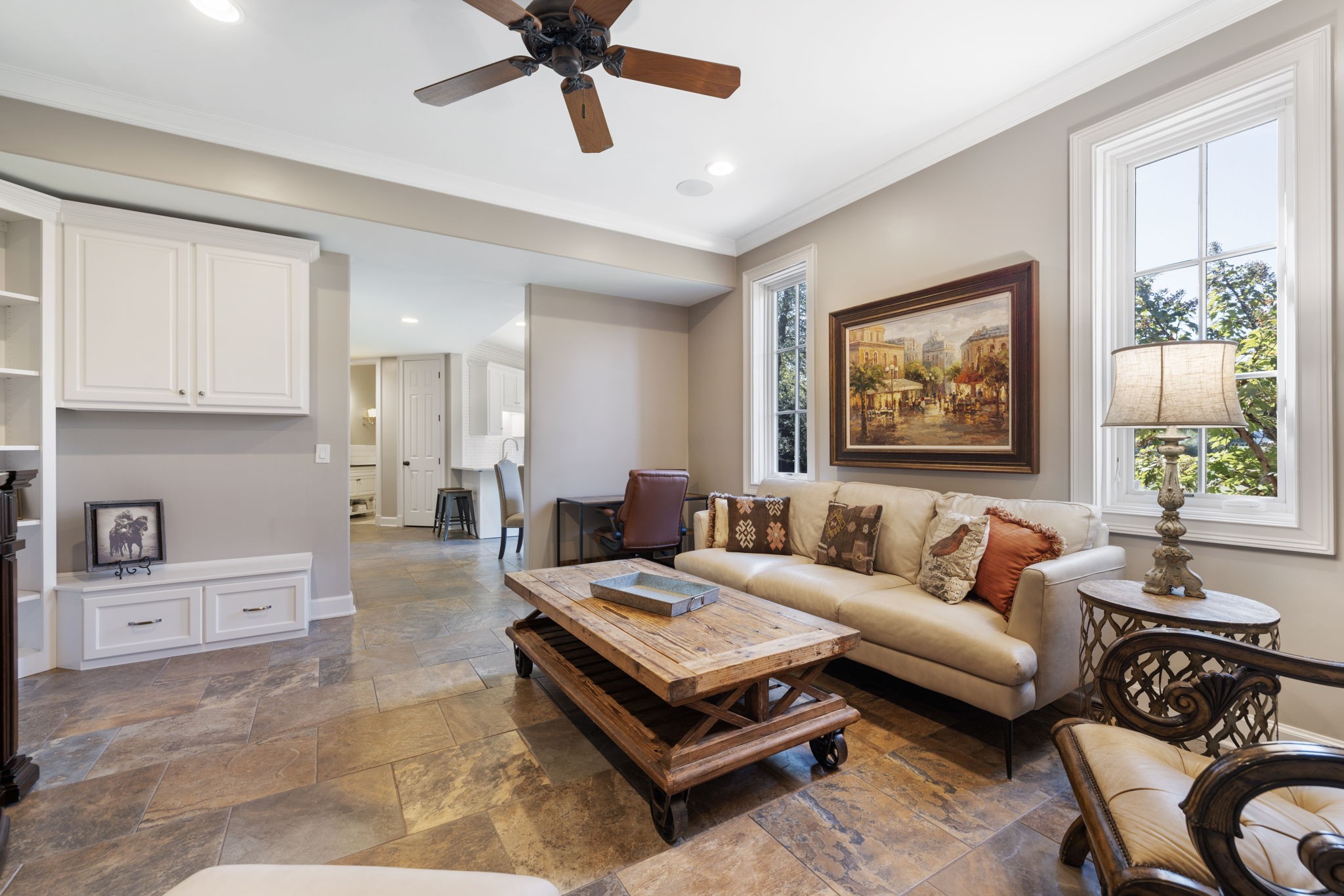 4219 Two Rivers Lane Franklin, TN 37069 - Photo 52 of 69 a living room with furniture and a painting on the wall