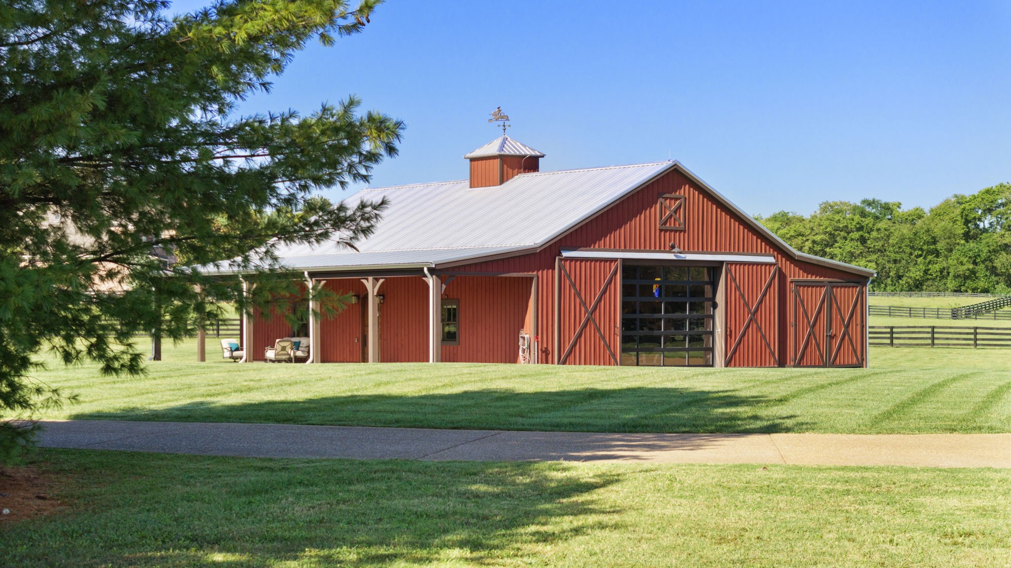 4219 Two Rivers Lane Franklin, TN 37069 - Photo 59 of 69 a front view of a house with a yard