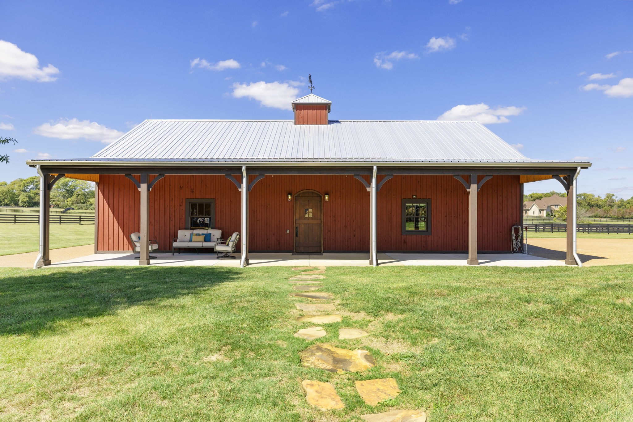 4219 Two Rivers Lane Franklin, TN 37069 - Photo 60 of 69 a view of a house with a yard and garage