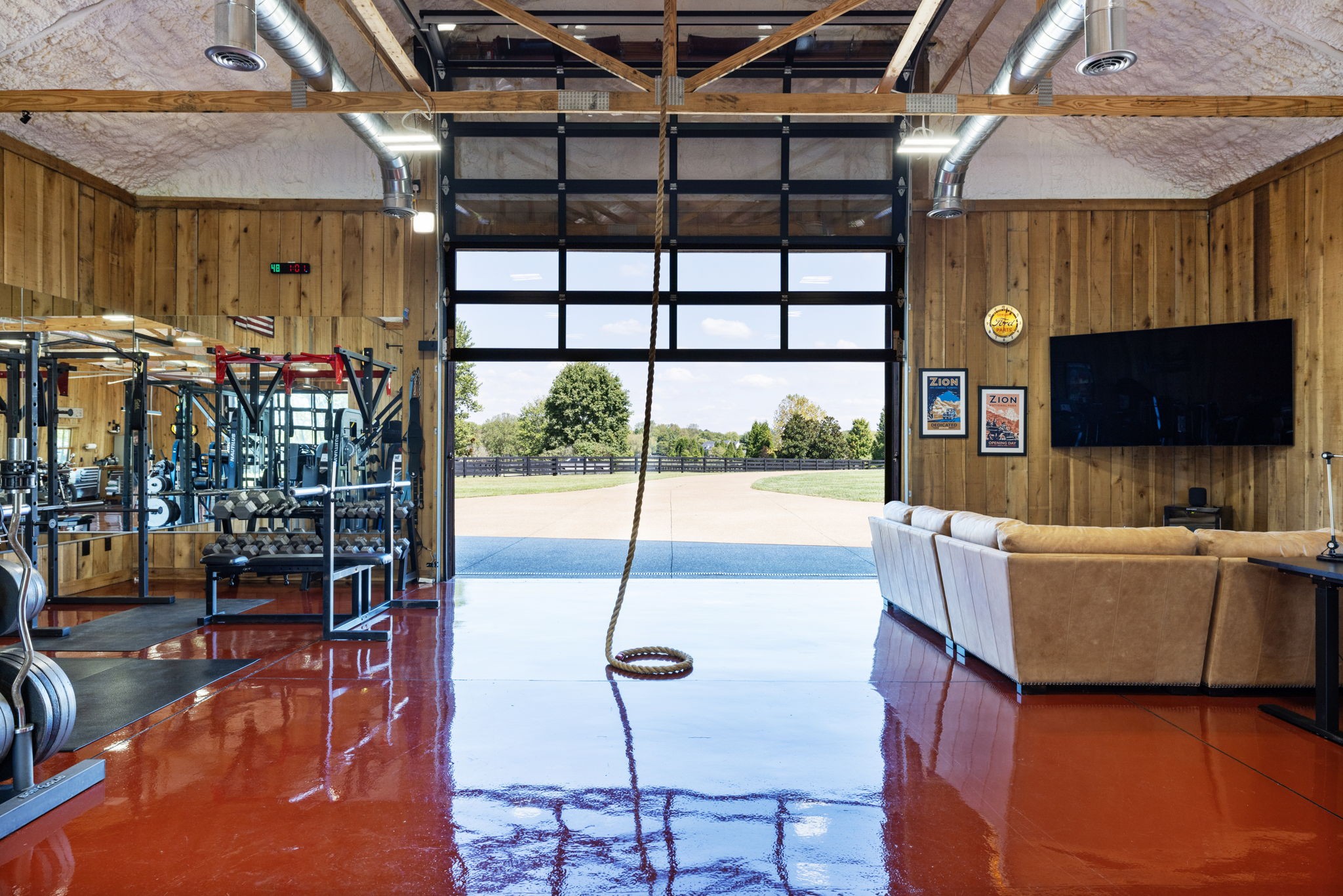 4219 Two Rivers Lane Franklin, TN 37069 - Photo 63 of 69 a living room with furniture and a flat screen tv