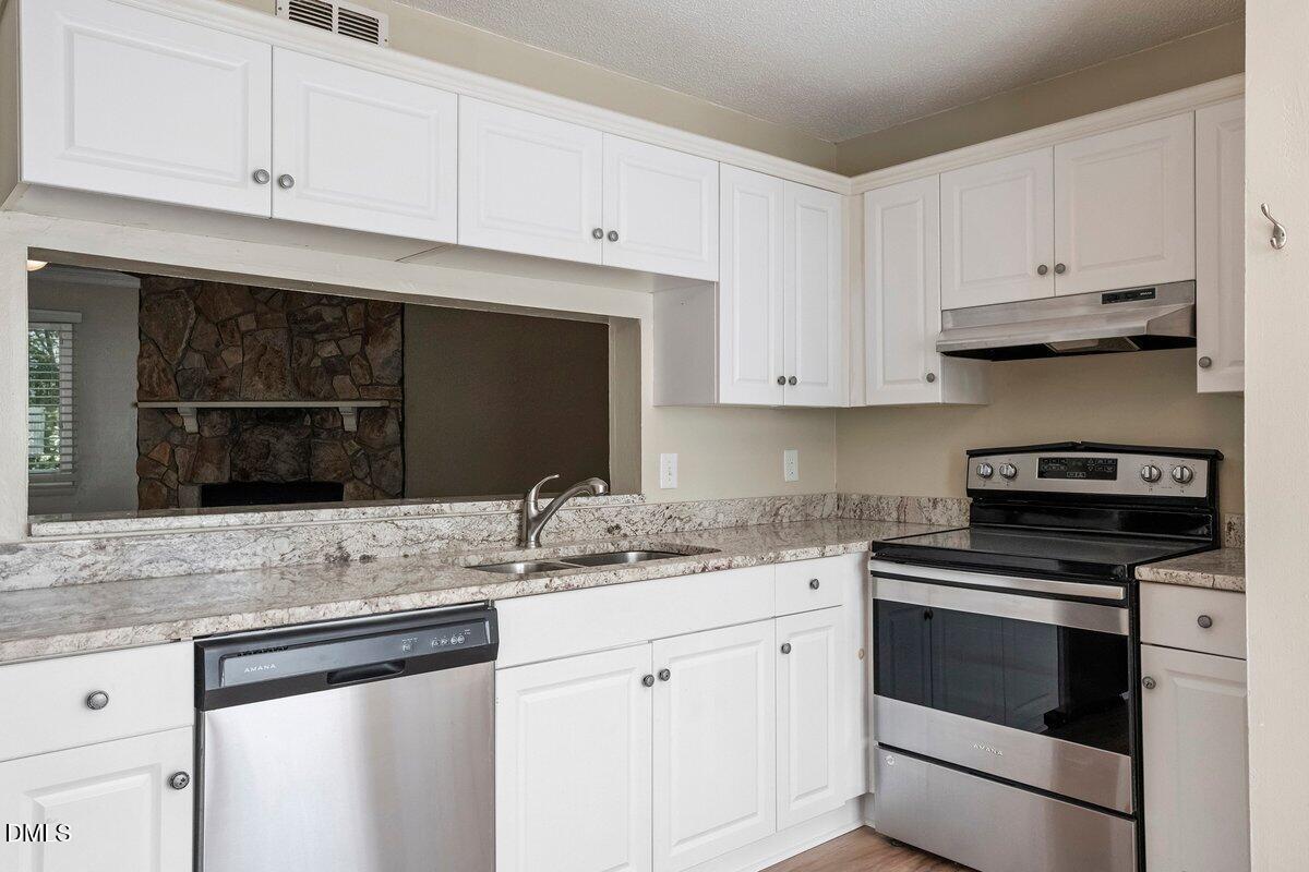 7733 Ohmann Court Raleigh, NC 27615 - Photo 8 of 27
