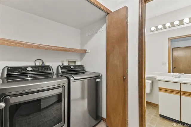a kitchen with appliances and cabinets