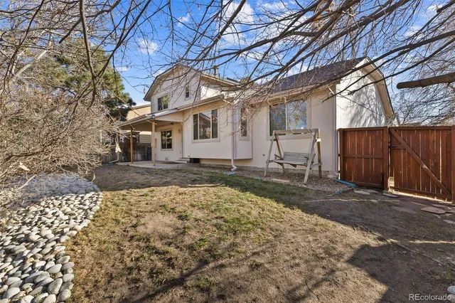 a picture of a bench in front of a window