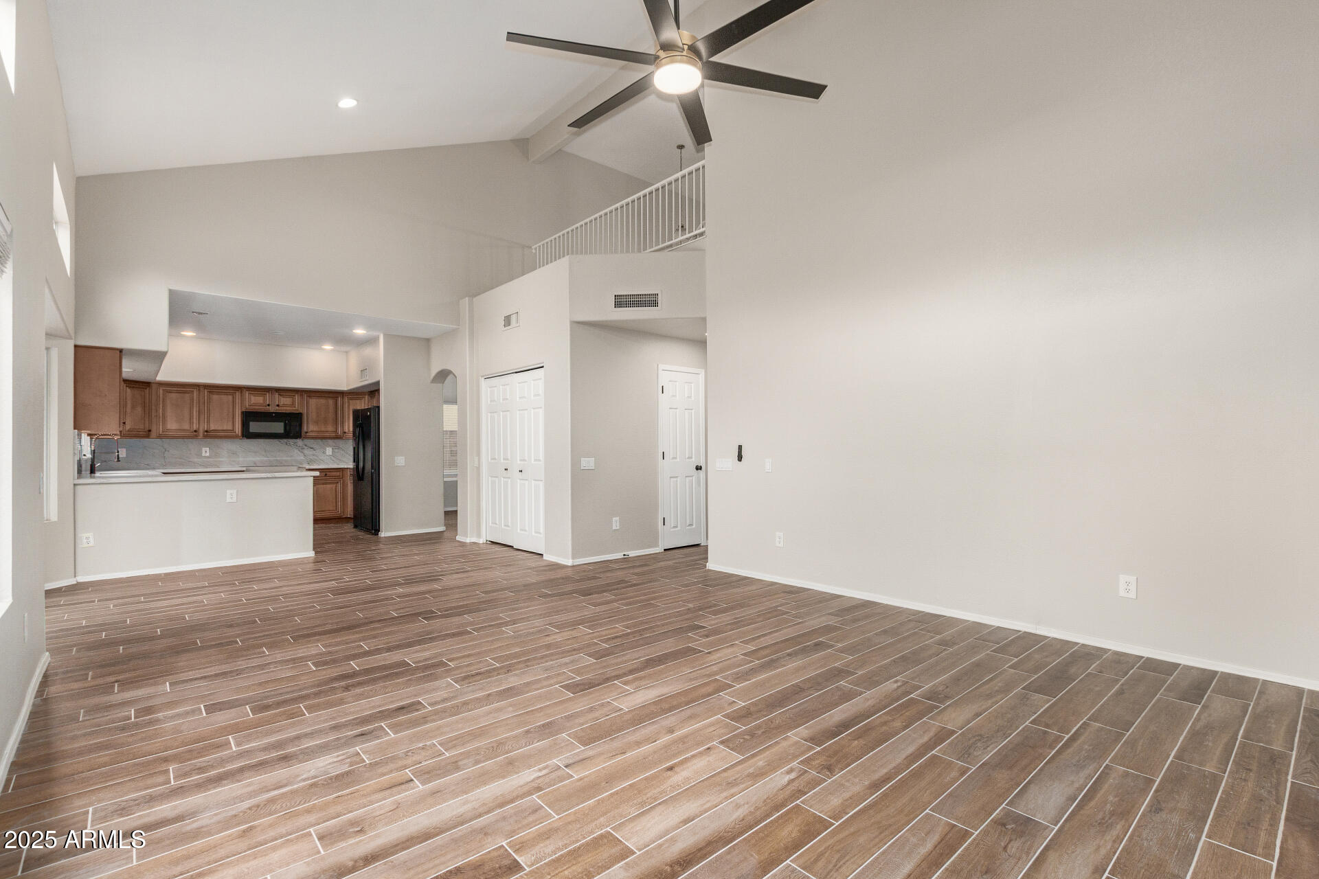 4522 East Rowel Road Phoenix, AZ 85050 - Photo 14 of 49 a view of a kitchen with a sink and a refrigerator