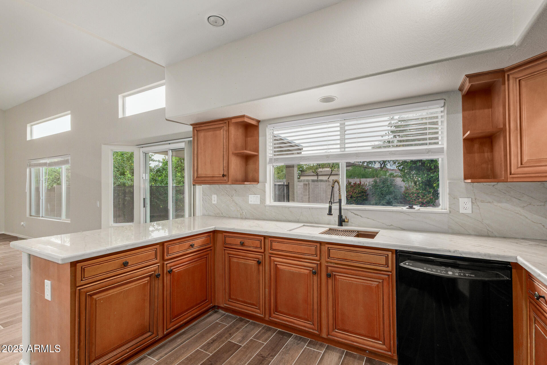 4522 East Rowel Road Phoenix, AZ 85050 - Photo 19 of 49 a kitchen with a sink and large window
