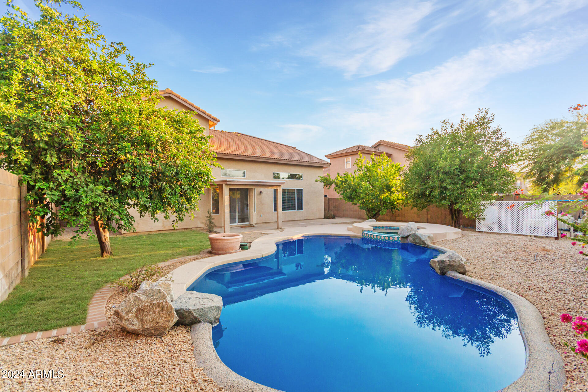 4522 East Rowel Road Phoenix, AZ 85050 - Photo 2 of 49 a front view of a house with garden