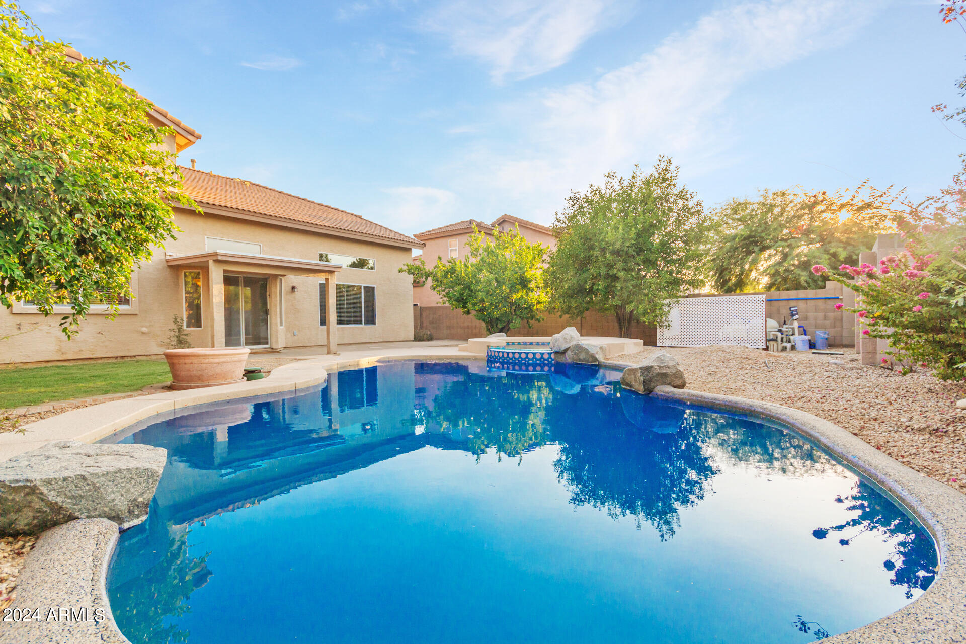 4522 East Rowel Road Phoenix, AZ 85050 - Photo 39 of 49 a view of a house with pool and a yard