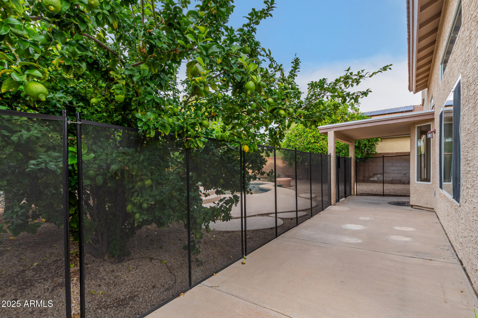 4522 East Rowel Road Phoenix, AZ 85050 - Photo 40 of 49 a view of a house with backyard and sitting area