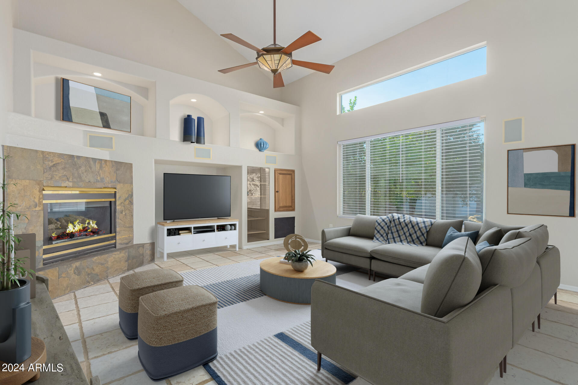 4522 East Rowel Road Phoenix, AZ 85050 - Photo 4 of 49 a living room with furniture a large window and a flat screen tv