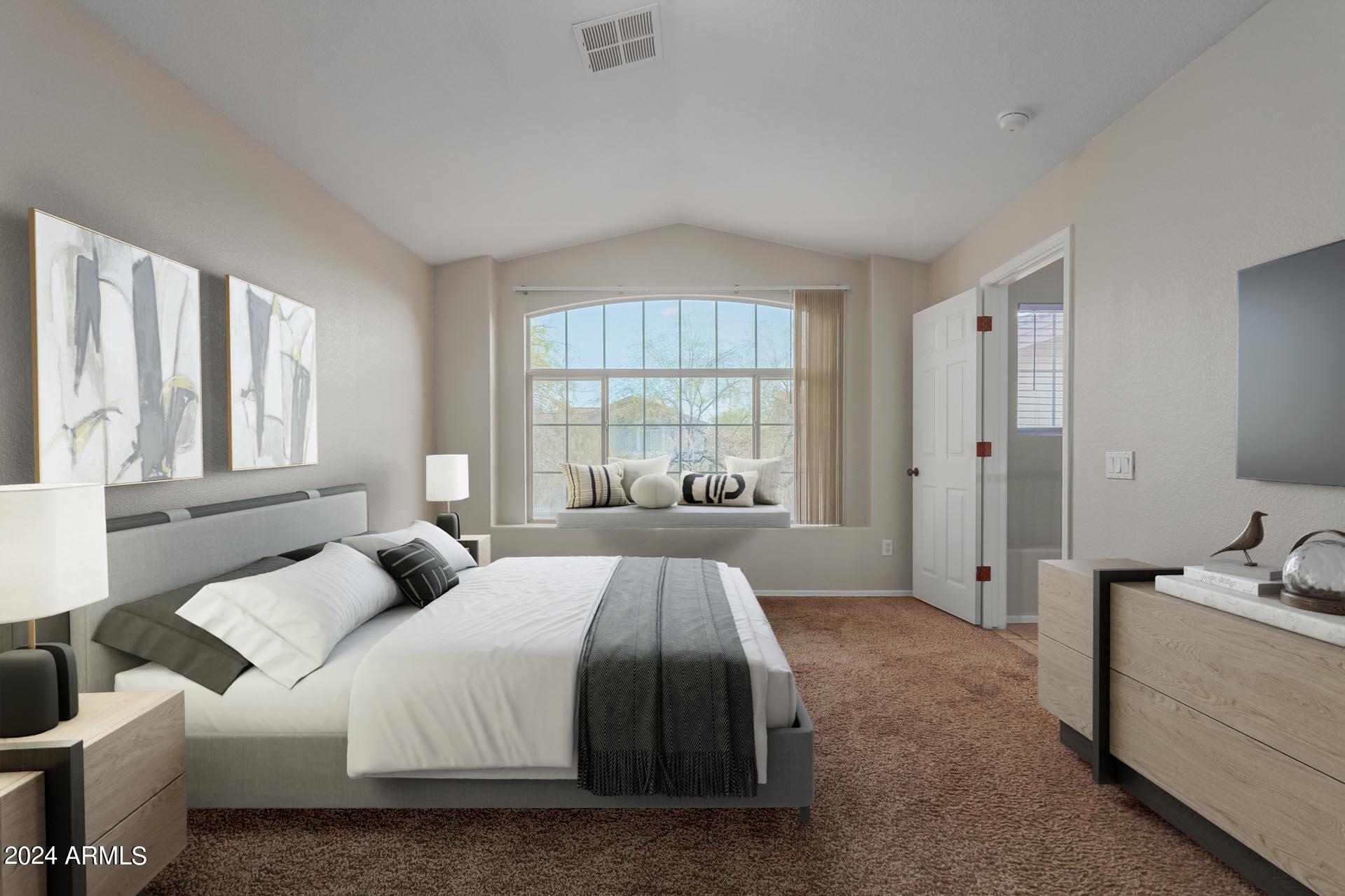 4522 East Rowel Road Phoenix, AZ 85050 - Photo 5 of 49 a bed room with a bed and a window