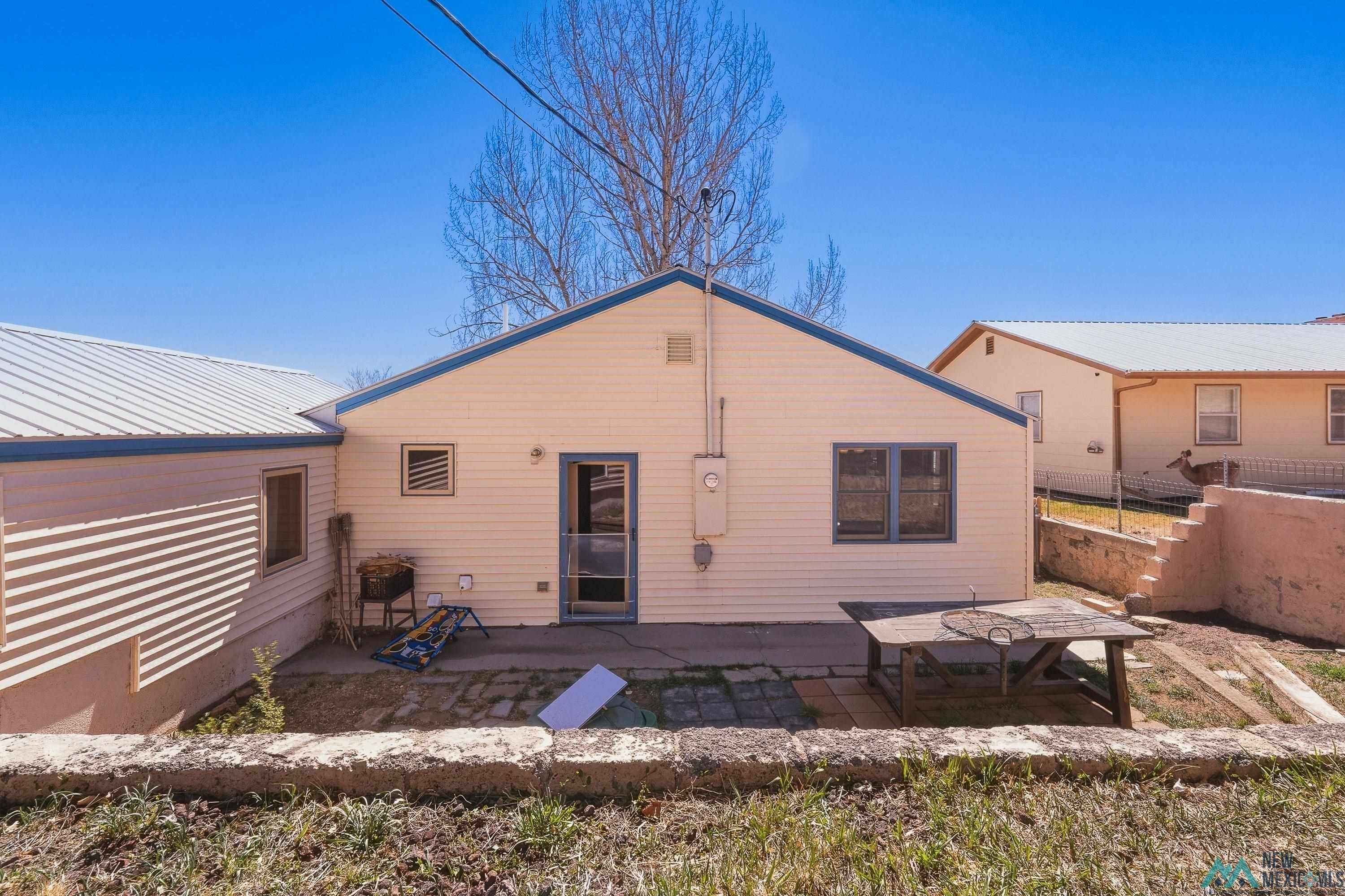 1432 South 5th Street Raton, NM 87740 - Photo 23 of 32 Back of house with a patio area