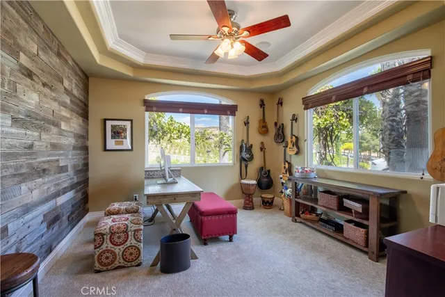 a kitchen with granite countertop a sink and cabinets