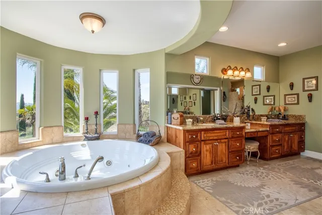 a view of a patio with table and chairs and potted plants