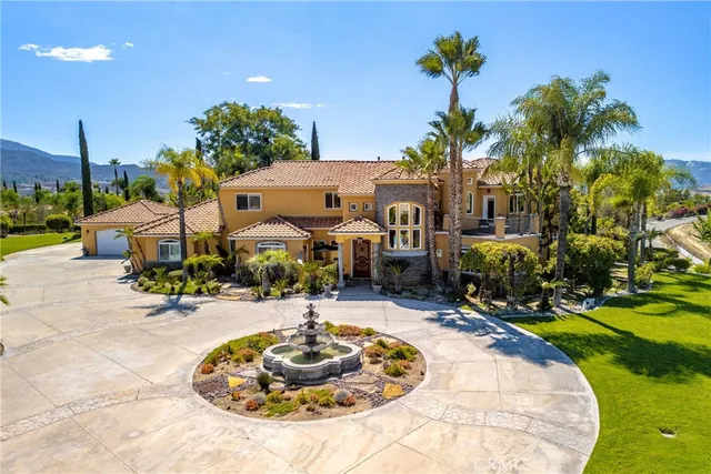a swimming pool with outdoor seating and yard