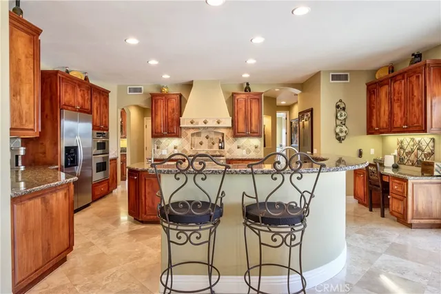 a view of a dining room kitchen and furniture