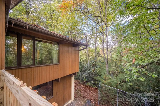 a view of a wooden fence from a balcony